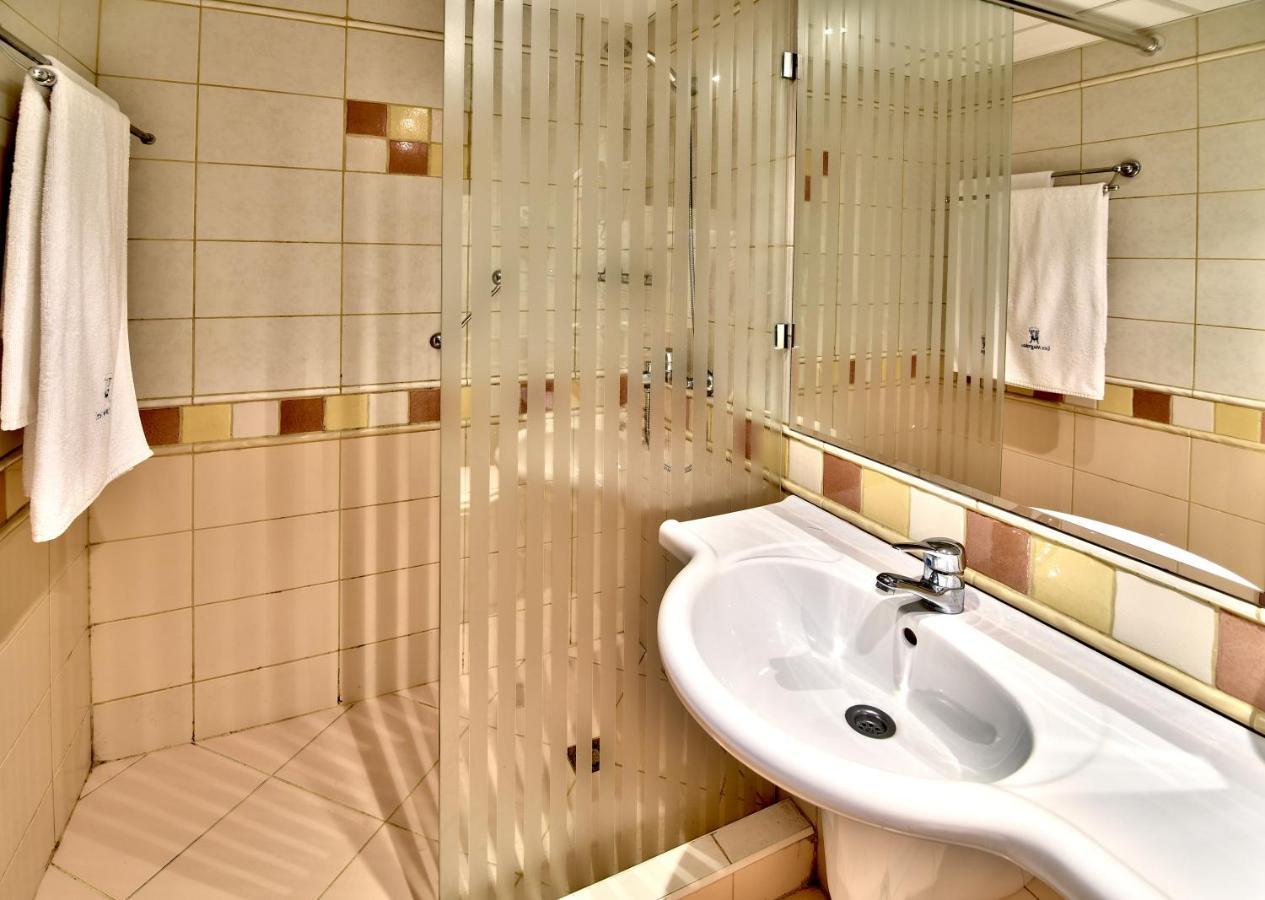 Les Magnolias Hotel Primorsko Bagian luar foto
